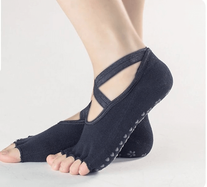 Black non-slip women's sports socks with open toes, showing breathable design and grip soles.